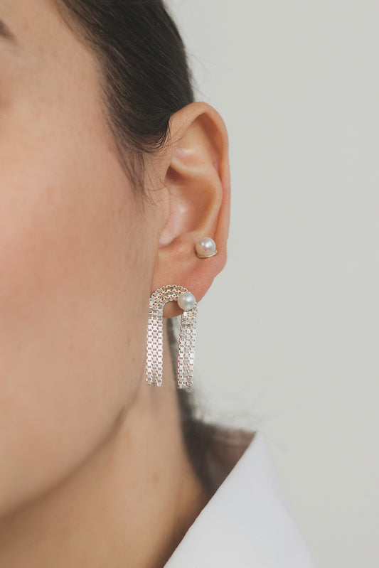 Martine Viergever earrings Arcade Pearl sterling silver in ear