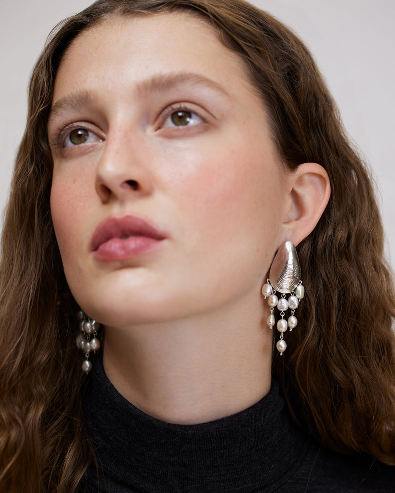 Statement mussel stud earrings with dangling freshwater pearls