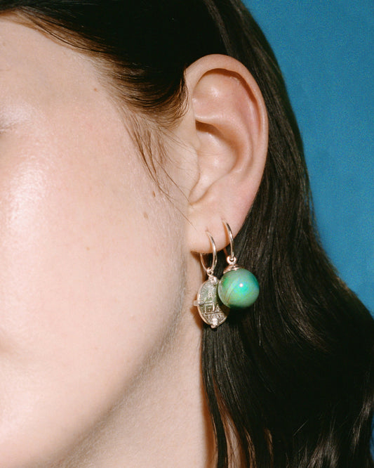 Trio of hoops with coin, hand and green agate ball in silver