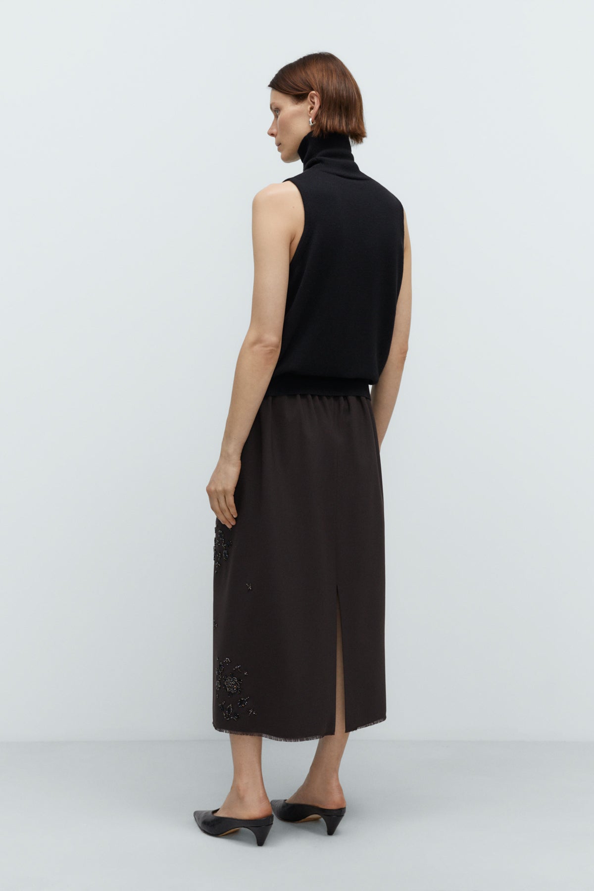 MERINO WOOL TURTLENECK VEST BLACK