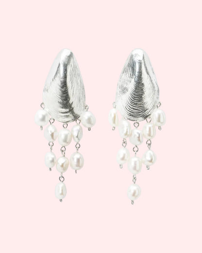 Statement mussel stud earrings with dangling freshwater pearls