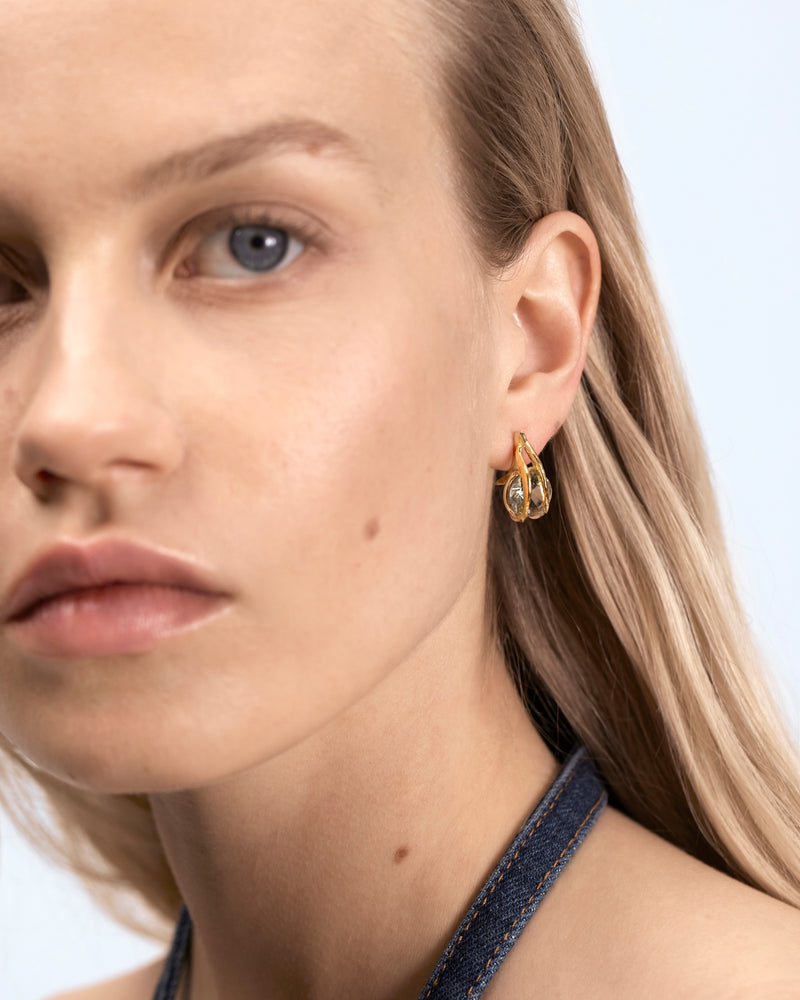 Stud earrings with leaves and green amethyst in silver