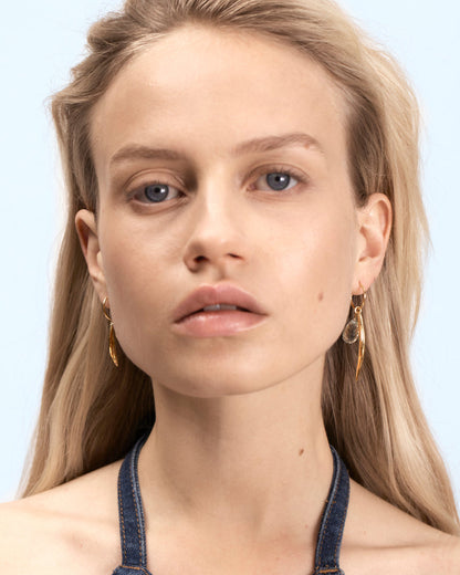 Asymmetric hoops with leaf and green amethyst
