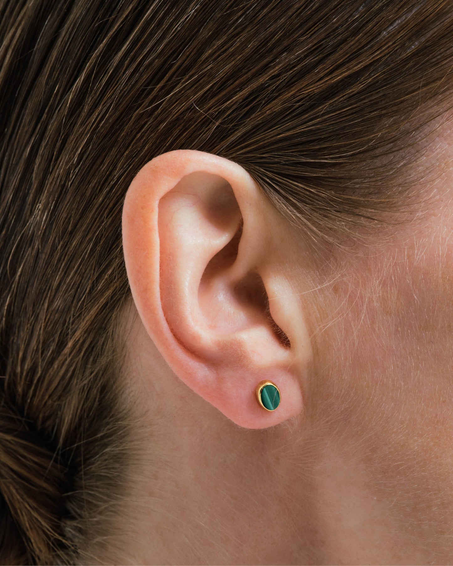 Stud earrings with malachite gold-plated silver