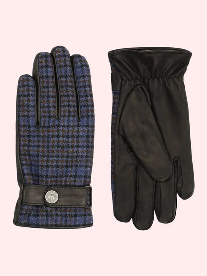 A pair of gloves shown side by side on a plain white background. The left glove features a blue and brown houndstooth pattern with black trim and a snap-button wrist strap.