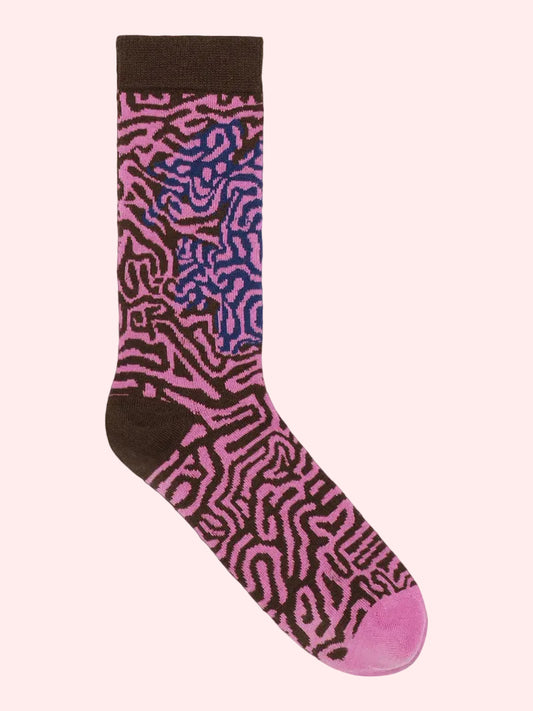 A single crew sock featuring a pink and dark brown maze-like pattern, with a solid dark brown cuff, heel, and toe, shown against a plain white background.