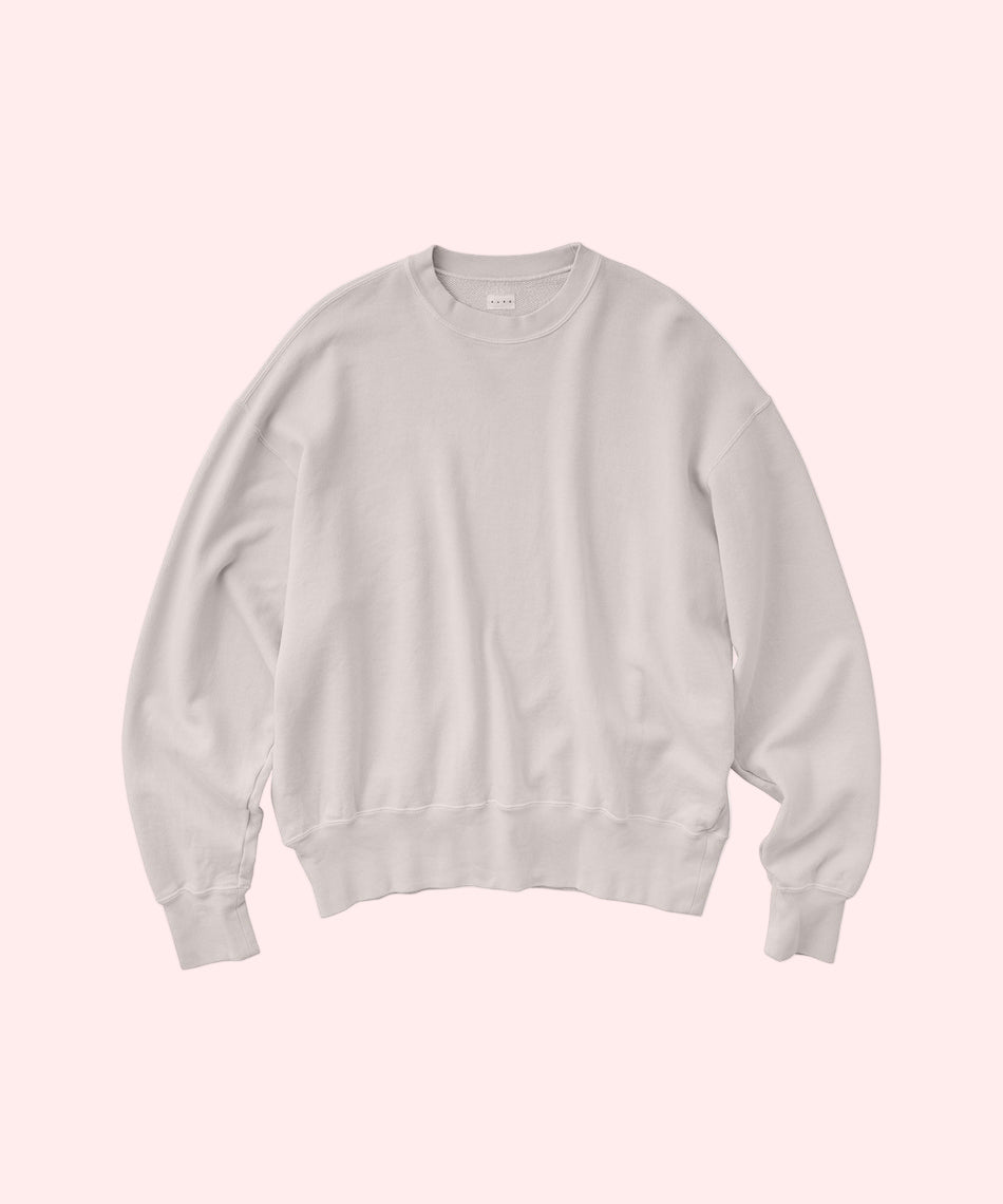 Light gray-pink sweatshirt on a white background