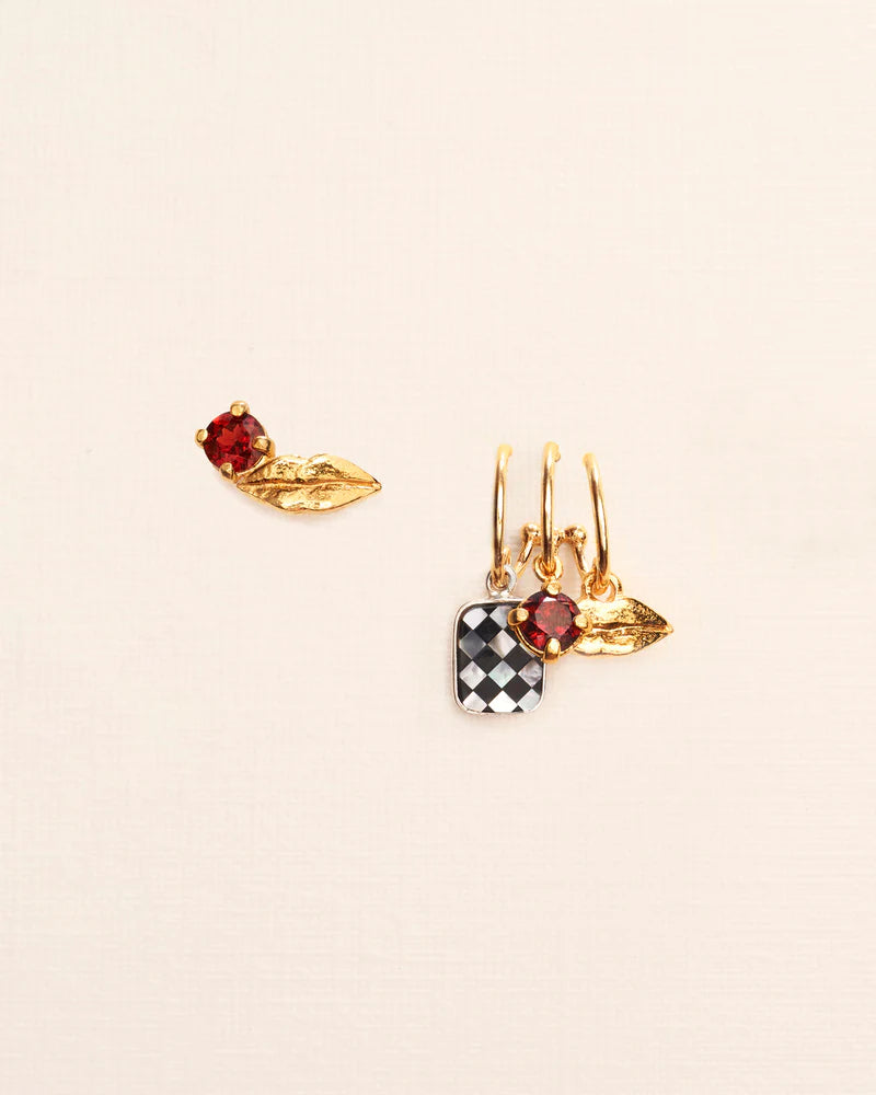 Wouters & Hendrix Trompe l'oeil earrings with lip, chess mosaic and garnet in silver